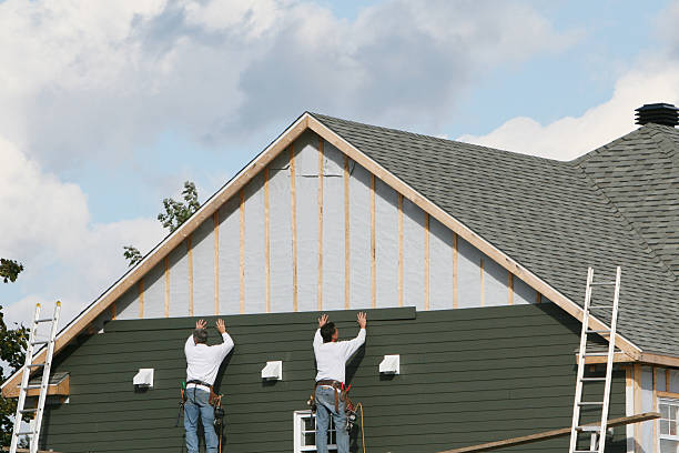 Professional Siding technician working in Enola, PA